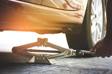 A jack under car 