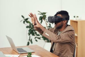 A man wearing a VR headset at work 